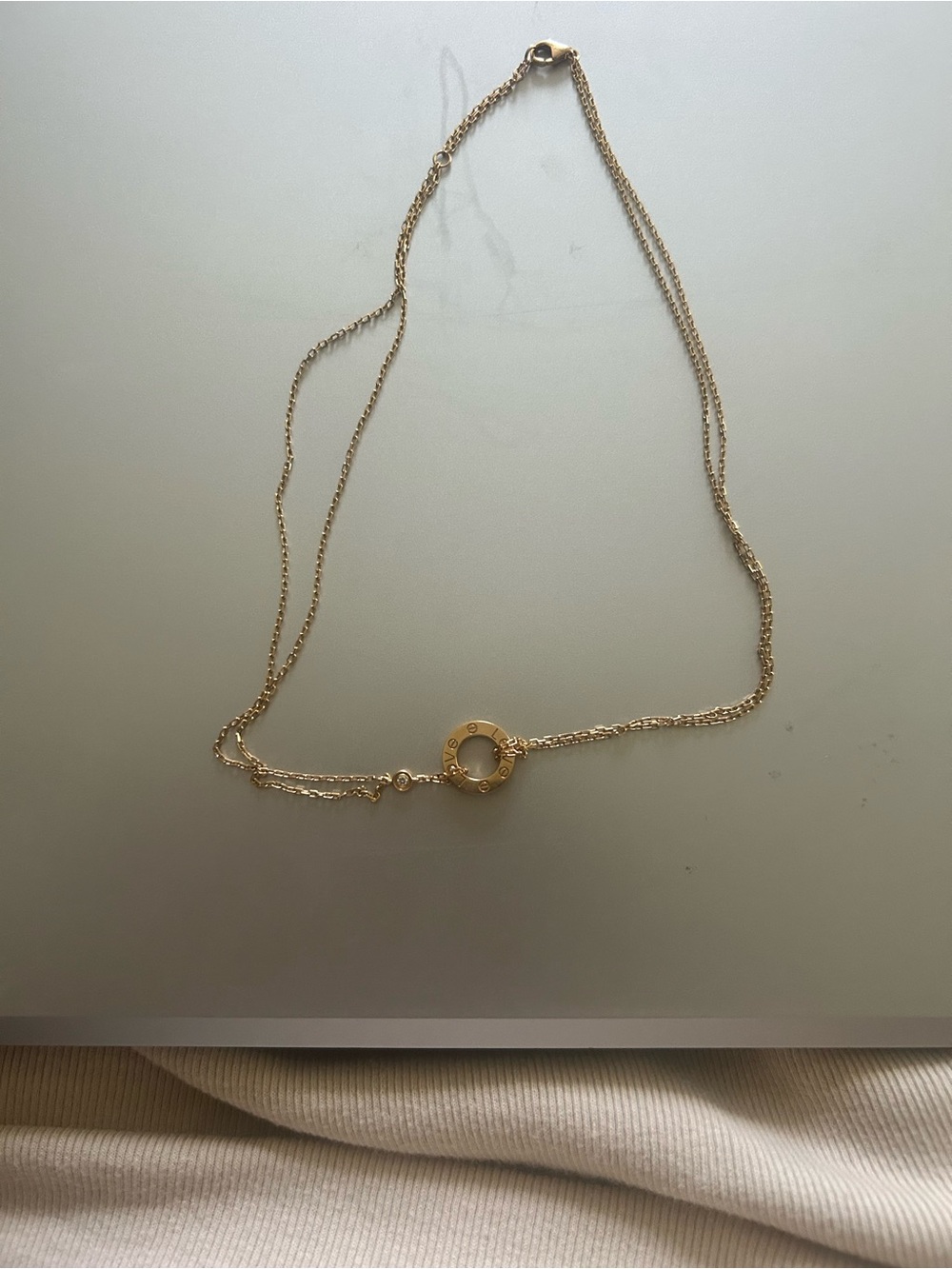 Cartier Gold Circle Signature Pendant Necklace